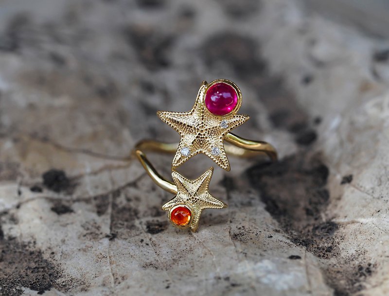 14k  gold ring with ruby, sapphire and diamonds.