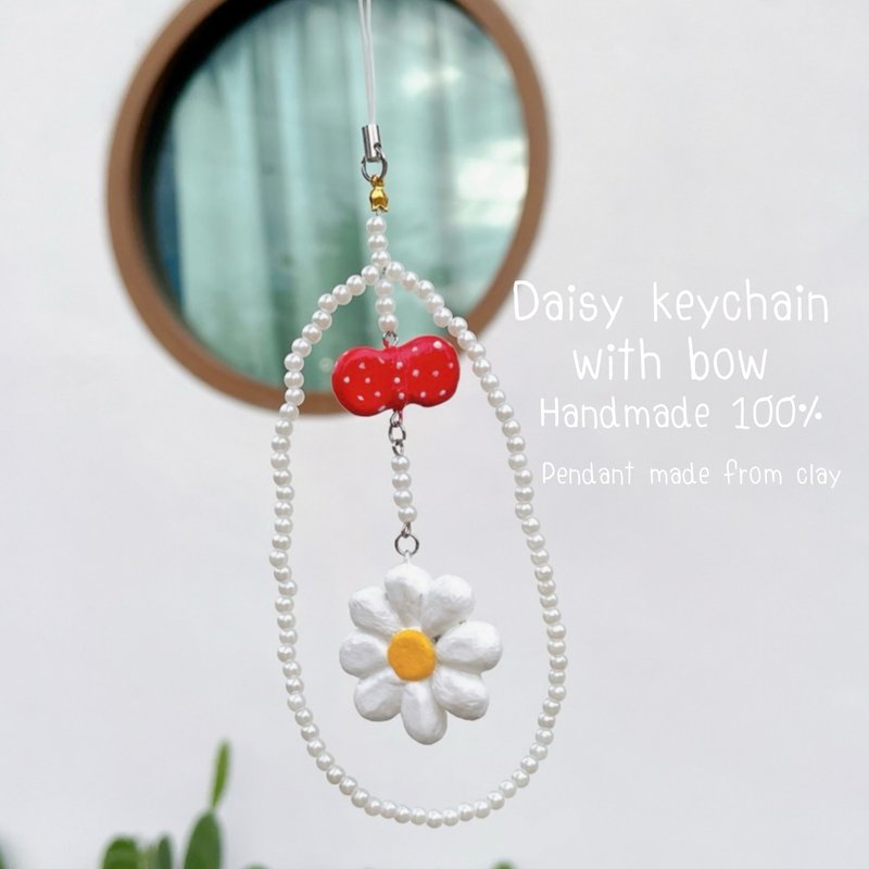 Keychain & Phone Strap Handmade Daisy with a cute red bow made from clay. - 吊飾/掛飾 - 黏土 