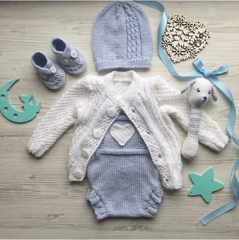 Hand knit clothing set for baby boy: sweater, romper, hat, booties, toy.