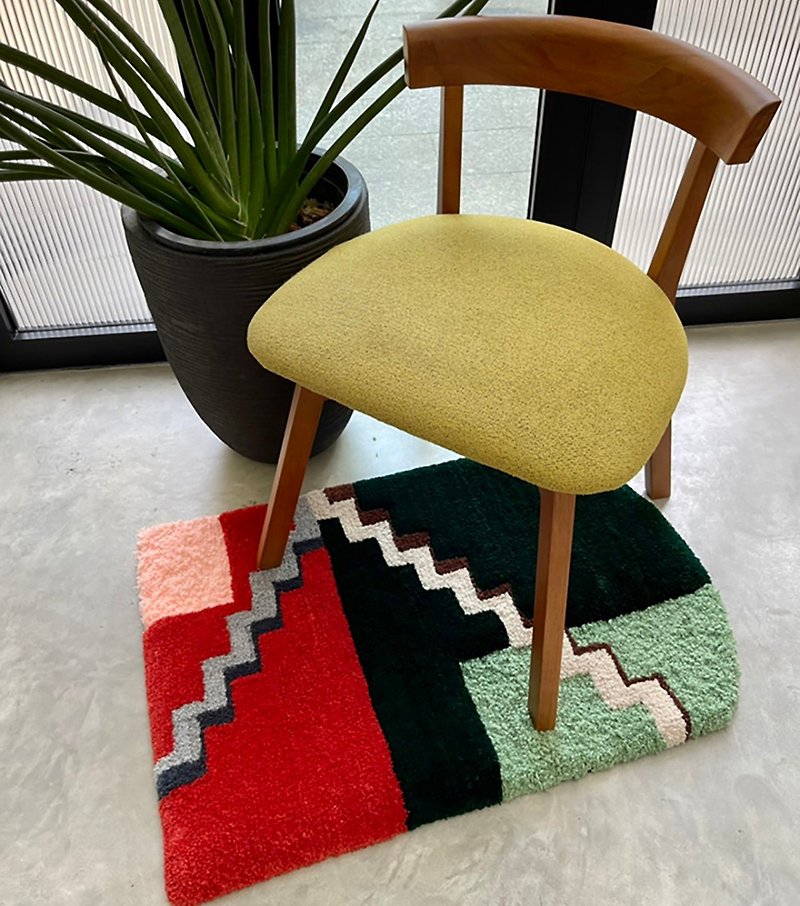 Handmade rug with geometric pattern