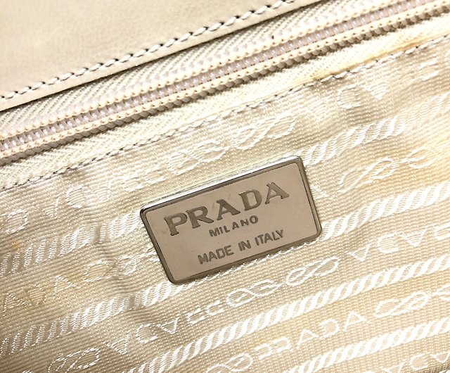 Japan direct delivery name plate used package] PRADA Prada logo embossed  leather hobo shoulder bag cream vintage Vintage Old iw335a - Shop solo-vintage  Handbags & Totes - Pinkoi