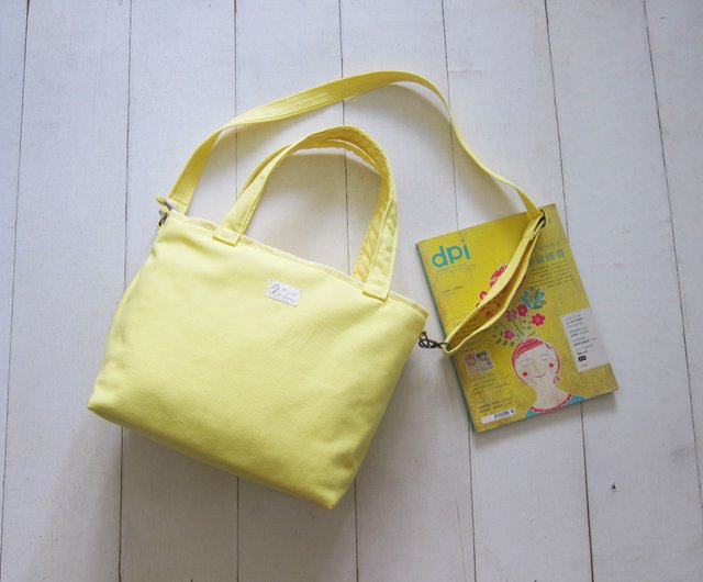 Bright yellow tote on sale bag