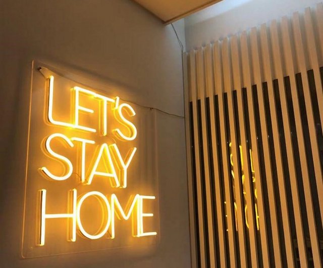 let's stay at home neon sign