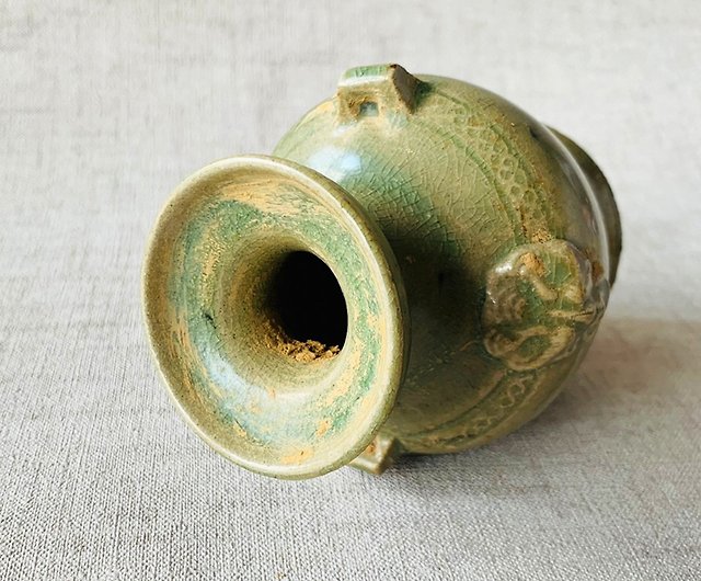 宋越窯の茶叶の末の釉薬人物形ランプの燭台の古い模造品の出土古磁器