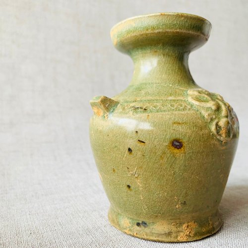 宋越窯の茶叶の末の釉薬人物形ランプの燭台の古い模造品の出土古磁器