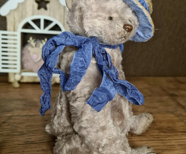 teddy bear with blue bow tie