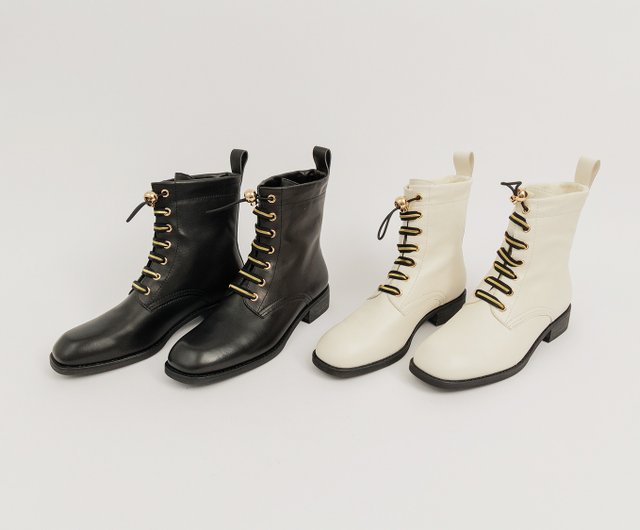 Leather lace-up boots with branded strap