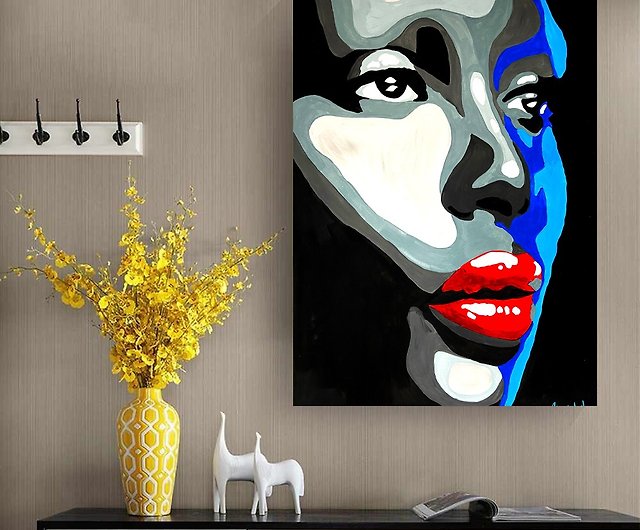 african woman painting abstract