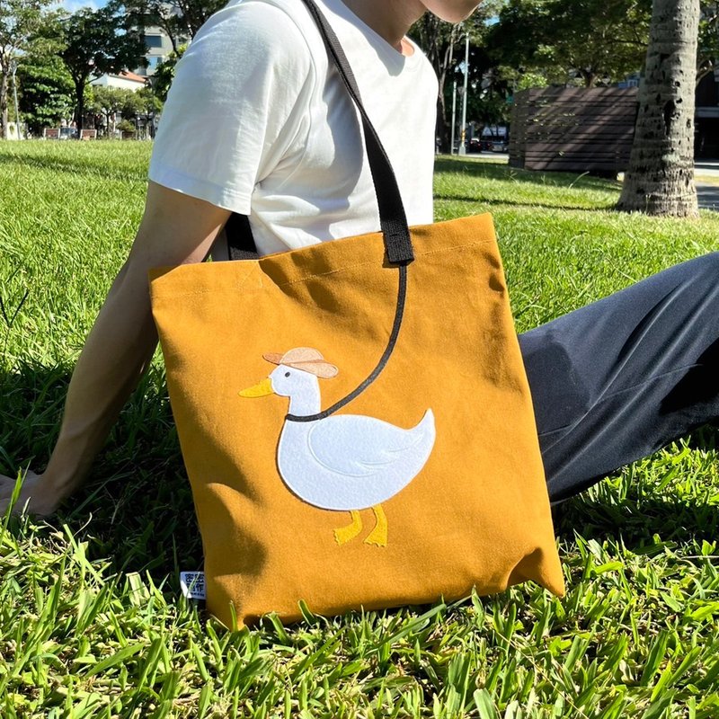 【Pattern is not printing】Leading duck, canvas bag - กระเป๋าแมสเซนเจอร์ - ผ้าฝ้าย/ผ้าลินิน สีส้ม