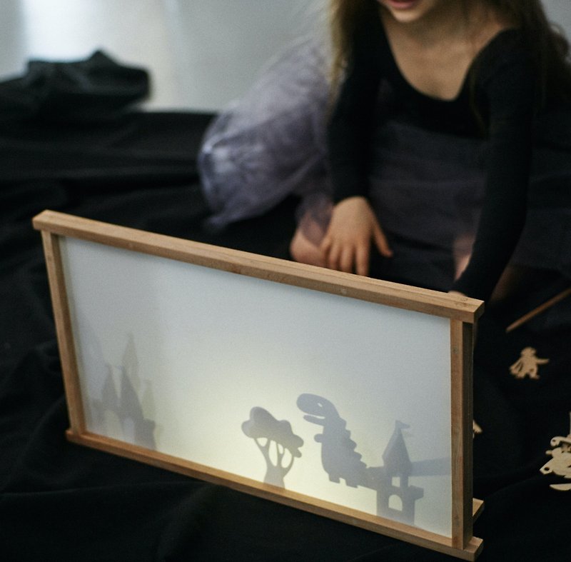 Table-top wooden shadow theater.
