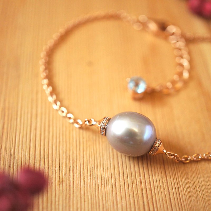 Victoria – 8x10mm Oval Freshwater Pearl With Blue Topaz 18k Rose Gold Plated Silver Bracelet - Bracelets - Gemstone Gray