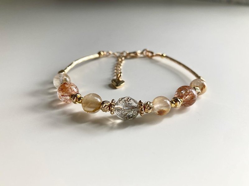 The crystal bracelet can be customized to attract wealth. The earth color system is very easy to match. The combination of gold titanium crystal, Bronze hair crystal, black gold super seven - สร้อยข้อมือ - คริสตัล 