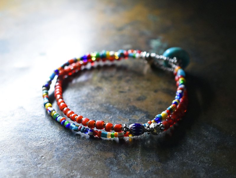 A double bracelet of Christmas beads, white hearts, Karen Silver and blue chevron beads. - Bracelets - Glass Red