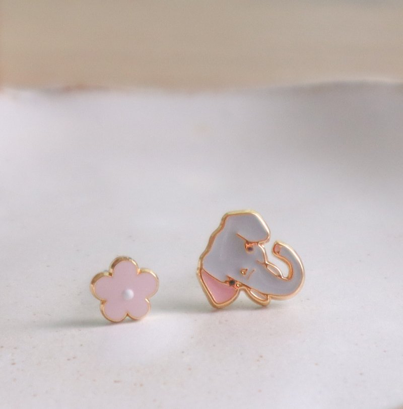 The Sumatran elephant is on the verge of extinction and is on sale with elephant flower clip-on earrings. - Earrings & Clip-ons - Enamel Pink