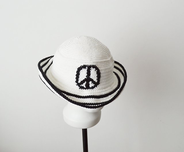 Crochet bucket hat embroidered peace symbol. Black white knit