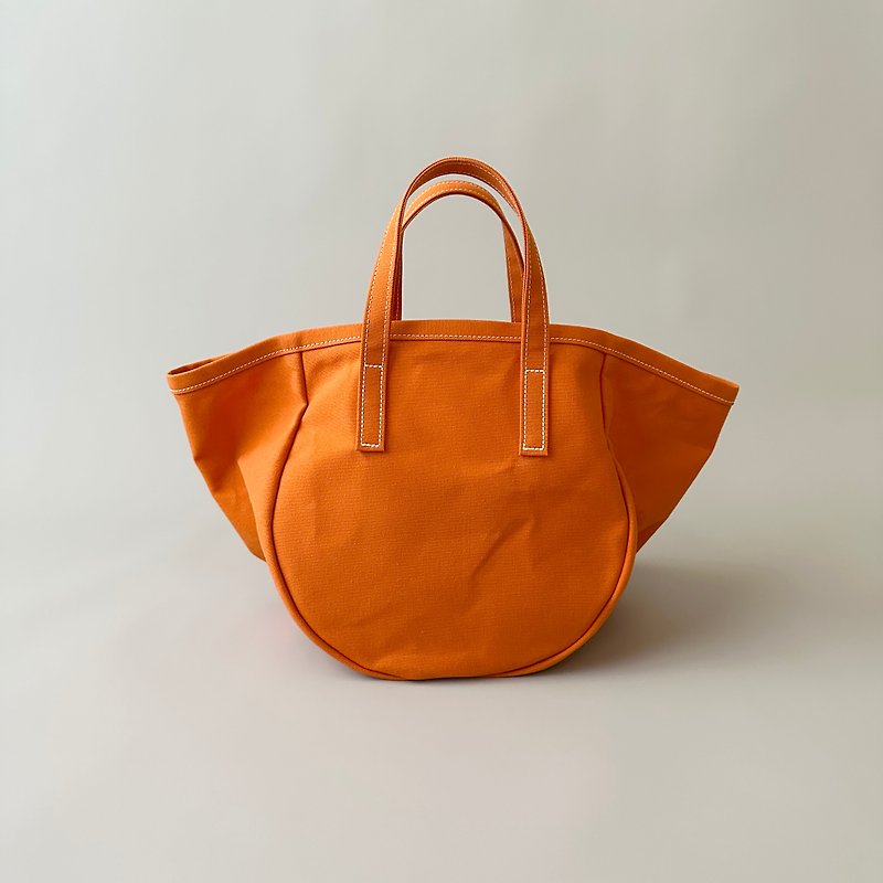 Round Tote Paraffin Orange - กระเป๋าถือ - ผ้าฝ้าย/ผ้าลินิน สีส้ม