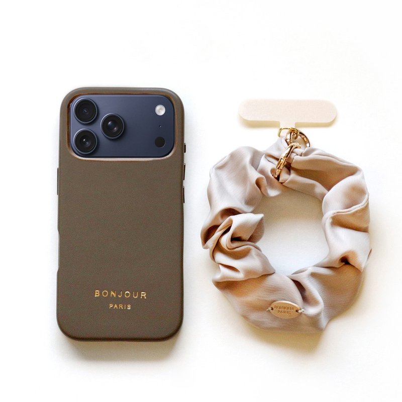 (殼+掛繩) iPhone17.16.15.14巴黎奶茶甜甜圈皮革磁吸充電手機殼 - 手機殼/手機套 - 塑膠 咖啡色