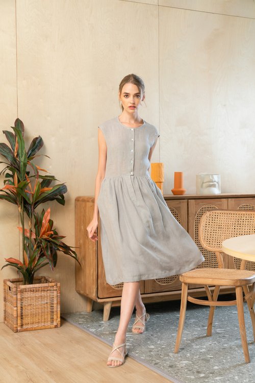 solstice linen front button midi dress with headband. gathered waist and pearl buttons