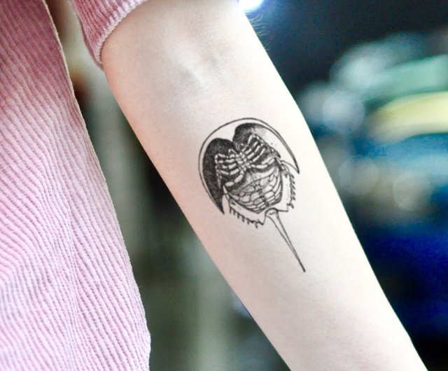 horseshoe tattoo with wings