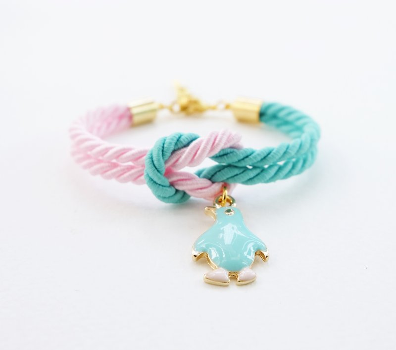 Matte Mint and pink knot bracelet with penguin charm - สร้อยข้อมือ - วัสดุอื่นๆ หลากหลายสี