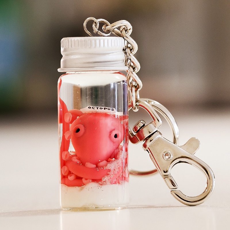 Customized luminous sand drifting octopus crystal ball rice carving key ring sand suction cup and quicksand will shine - Keychains - Clay Red