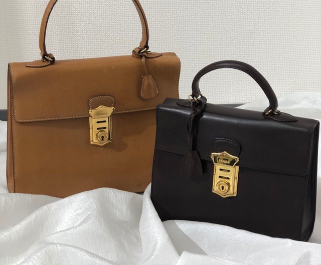 日本直送 名牌中古包 】PRADA プラダ メタルクロージャー レザー ...