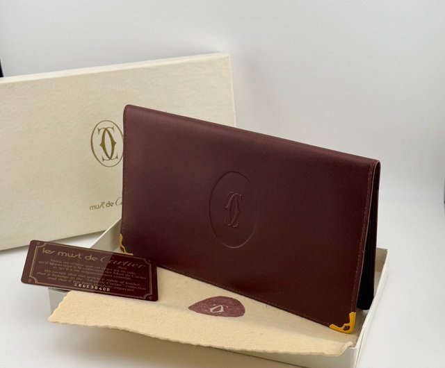 カルティエの財布 Cartier カルティエ 長財布 二つ折り レザー ロゴ 型押し 黒