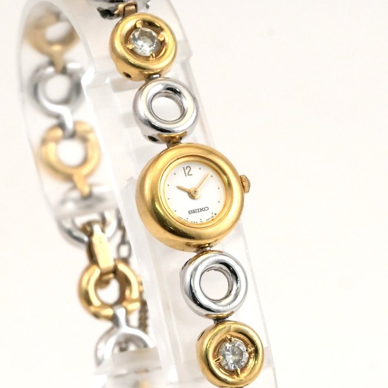 送料無料 SEIKO 1E20-0020 ストーン付きベルト 白文字盤 女性用 クォーツ腕時計 手錶 古董錶 復古手錶 日本直送 - 女錶 - 不鏽鋼 金色