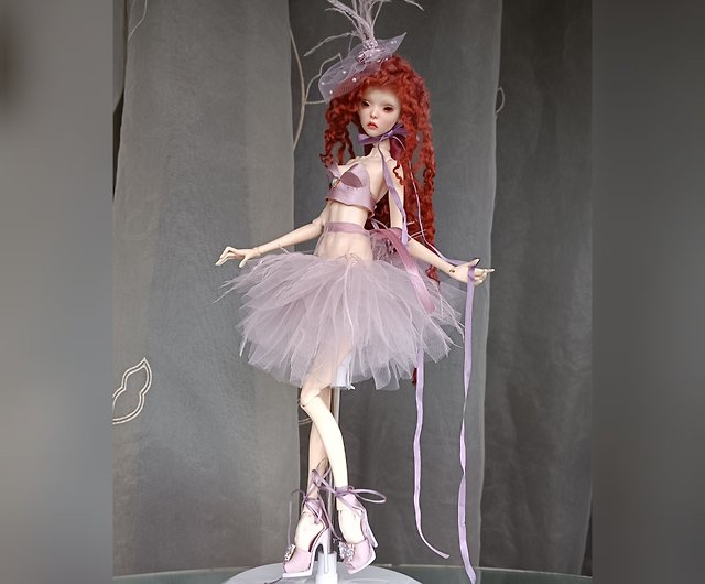 The wig is made by hand, especially for the Popovy sisters doll