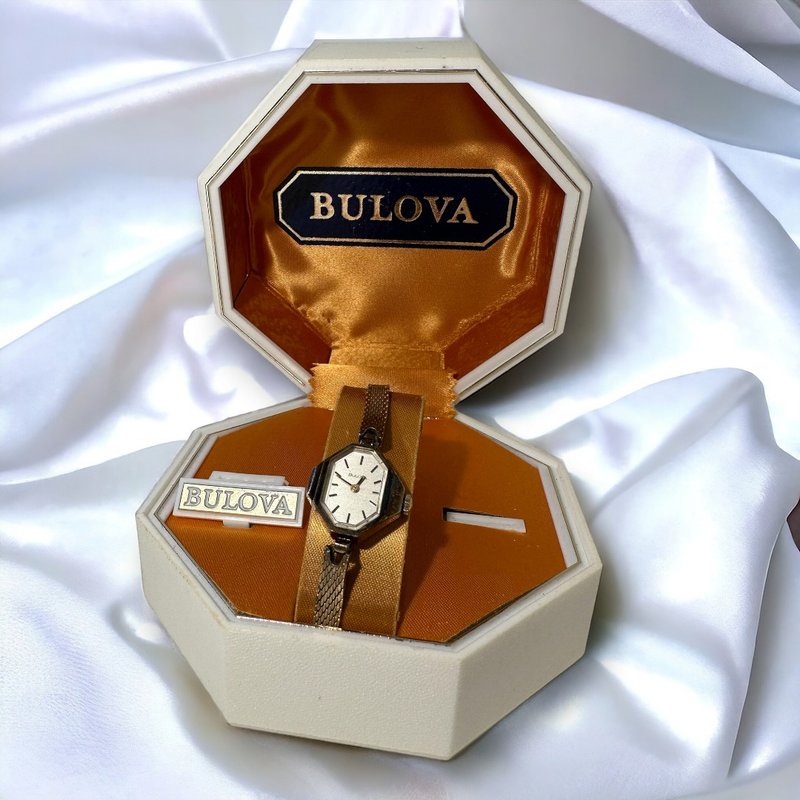 Bulova hand-wound watch with original hexagonal box - Women's Watches - Other Metals Gold