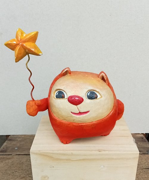natlamoonstudio A feisty orange cat grabs a star and delivers it.