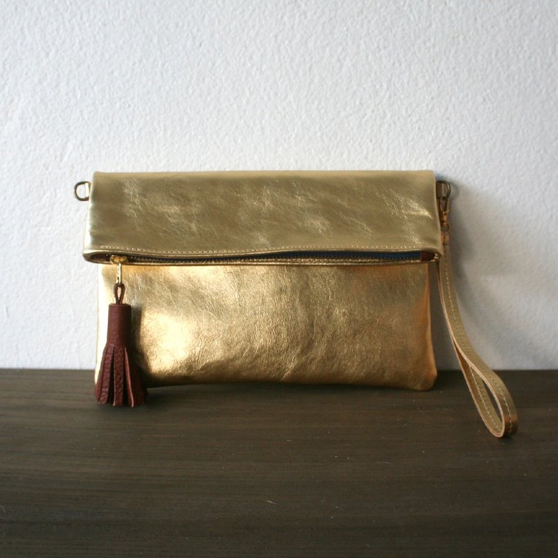 gold wristlet clutch