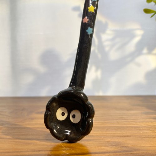 cher’s pottery Handmade ceramic spoon with black dust from Totoro.