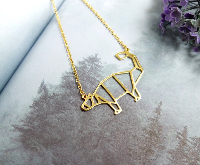 dinosaur gold necklace