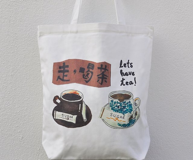 お茶綿キャンバスリサイクルイラストトートバッグを持ってみましょう