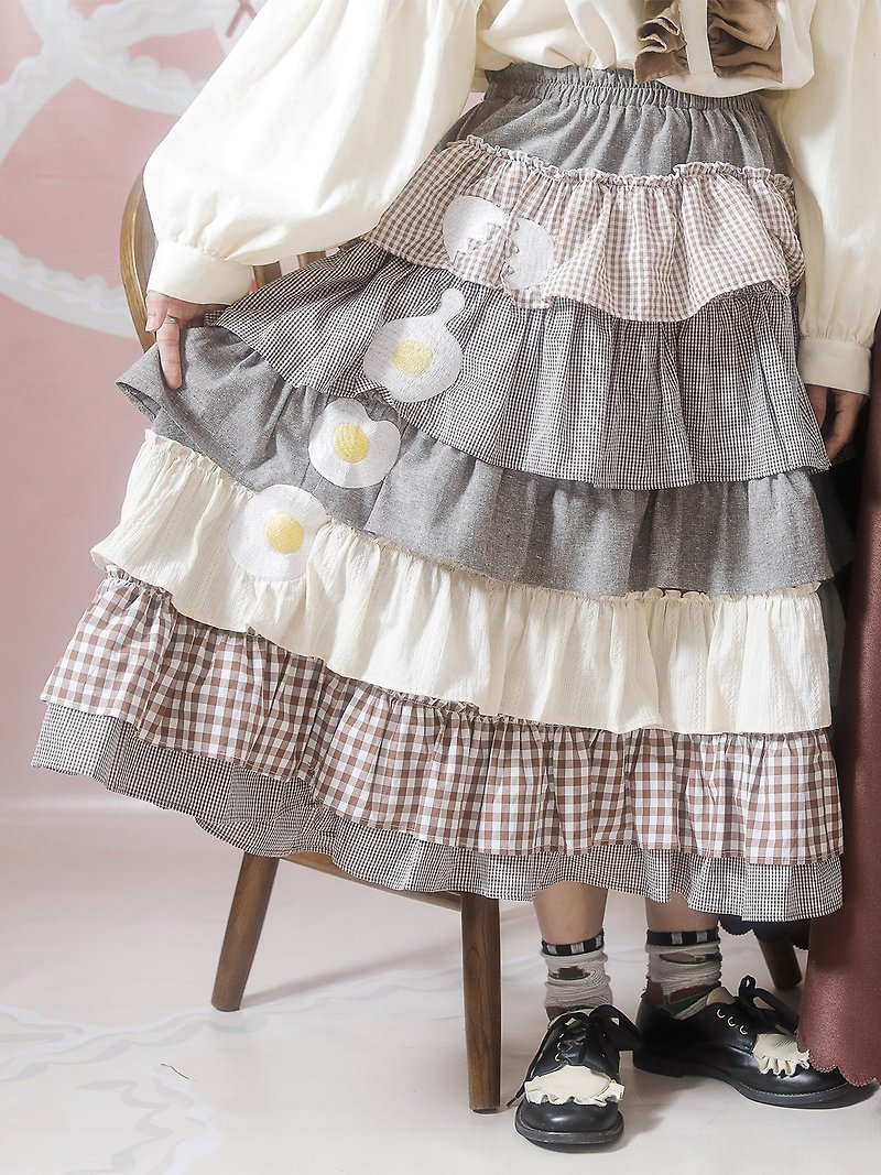 Meugler Niu Choudao [Yixu Dinner] Poached egg Brown grid stitching girl cake skirt