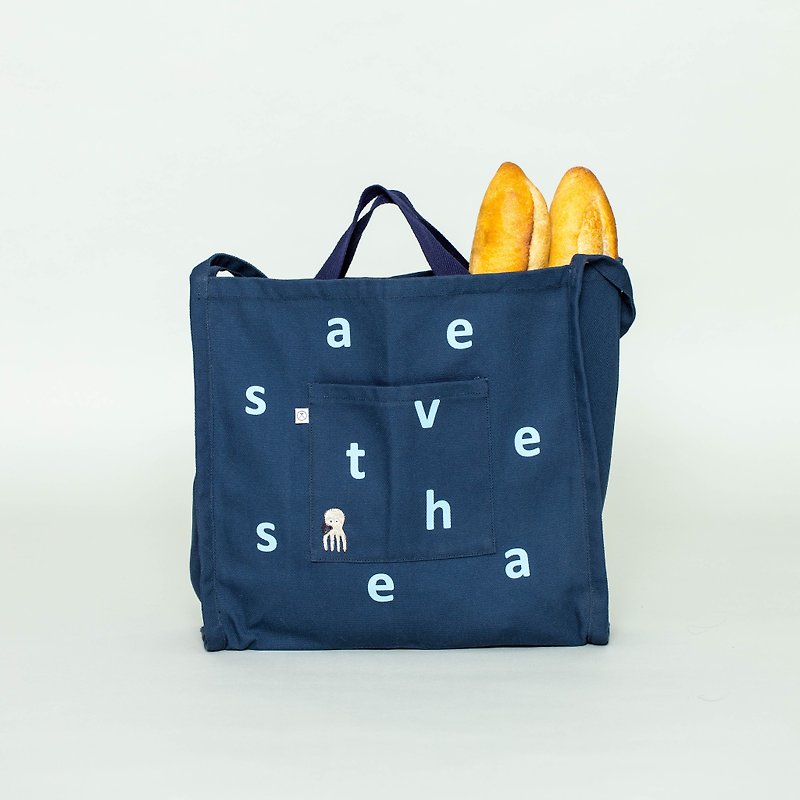 Ocean series embroidered environmentally friendly dual-purpose backpack dark blue - กระเป๋าถือ - ผ้าฝ้าย/ผ้าลินิน สีน้ำเงิน
