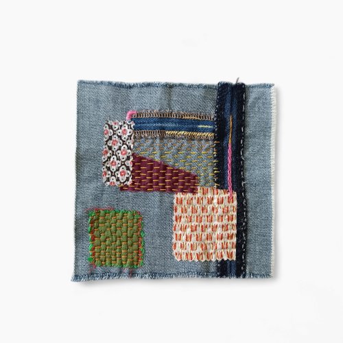OUMsk Upcycled denim boro patch. Slow stitching.