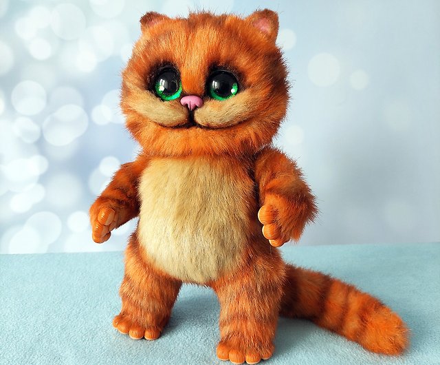 オレンジ色のチェシャー猫、ぬいぐるみ、オーク、ポーズ可能な生き物