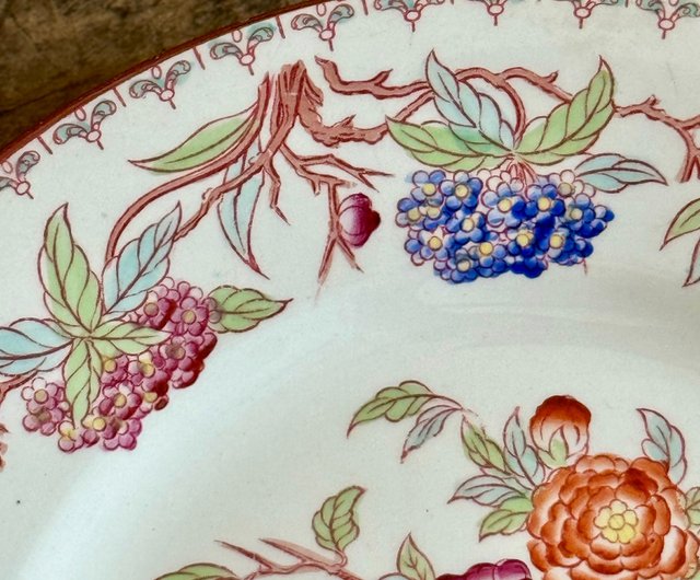 Sarreguemines retailer Plates, Hand Painted Set of Two. He and She 9 1/2 inches in diam.