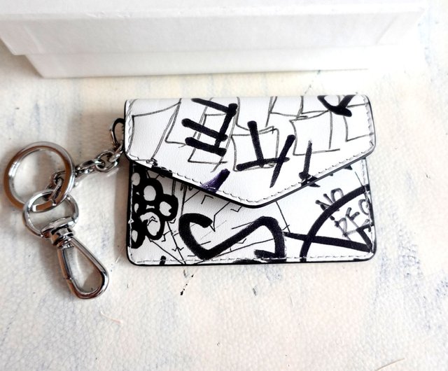 Maison Margiela MM11 white graffiti style printed pattern