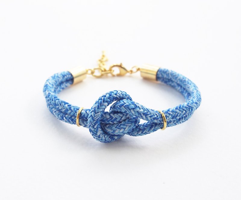 Blue knot bracelet with gold material - สร้อยข้อมือ - วัสดุอื่นๆ สีน้ำเงิน