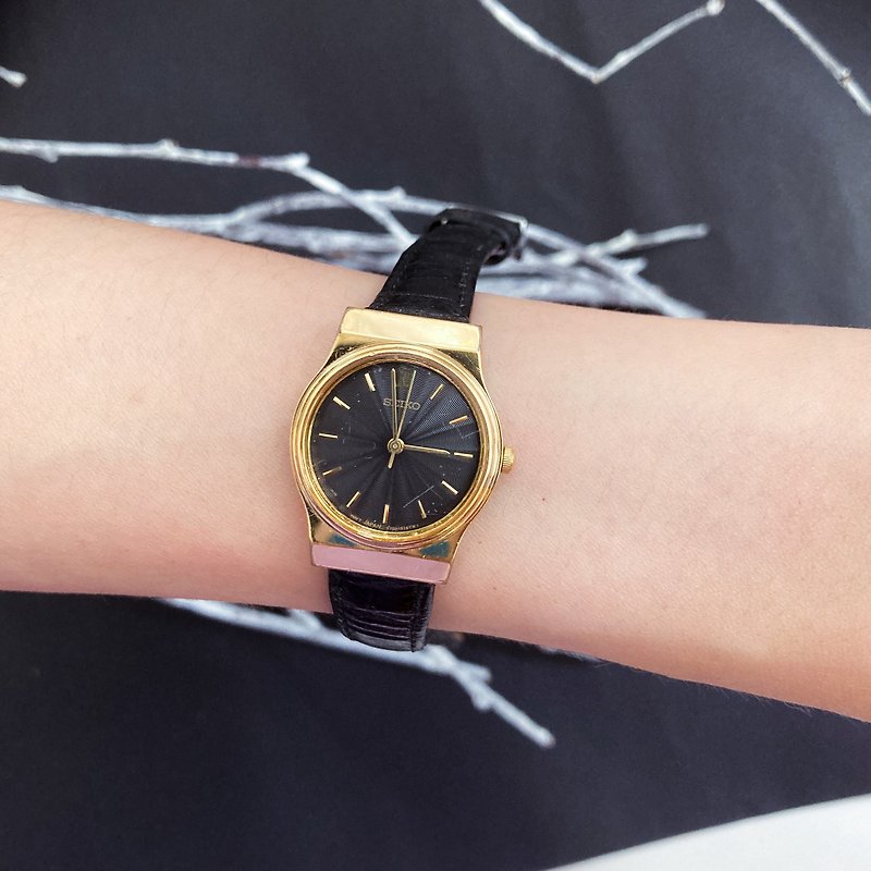 セイコースペシャルブラックメタルラジアルダイヤルゴールドケースレザーストラップアンティークウォッチ - 腕時計 - その他の素材 ゴールド