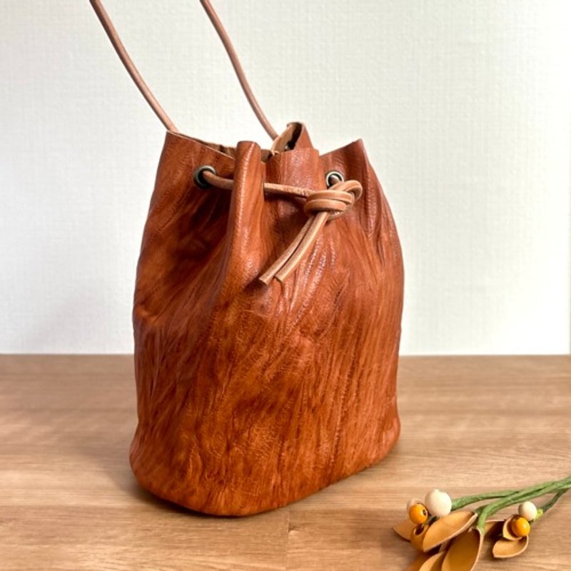 Early Christmas Sale! A drawstring shoulder bag made of tastefully textured leather that can fit a long wallet. Tanned leather (Nubuck leather) - Messenger Bags & Sling Bags - Genuine Leather Brown