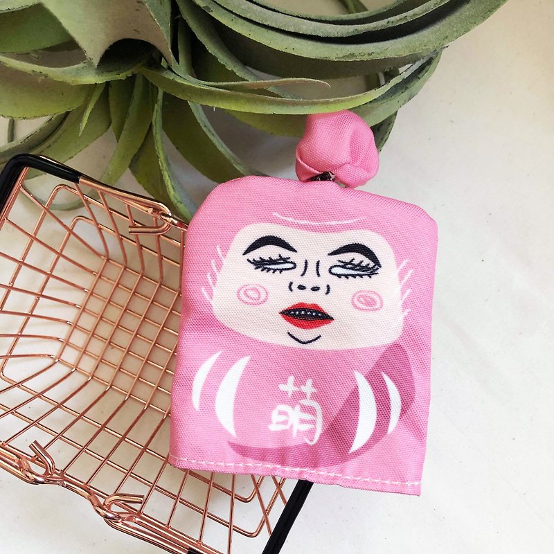 A pink cute key case with anti-white eyes