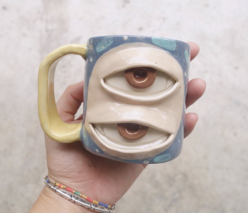 Handmade ceramic mug 2 eye in bluepastel.