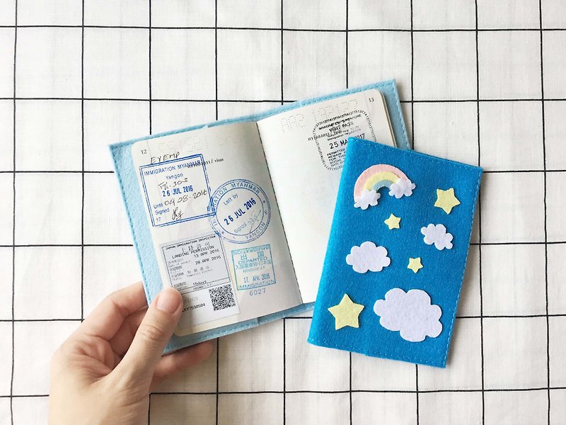 Blue sky, cloud, rainbow and star passport cover.