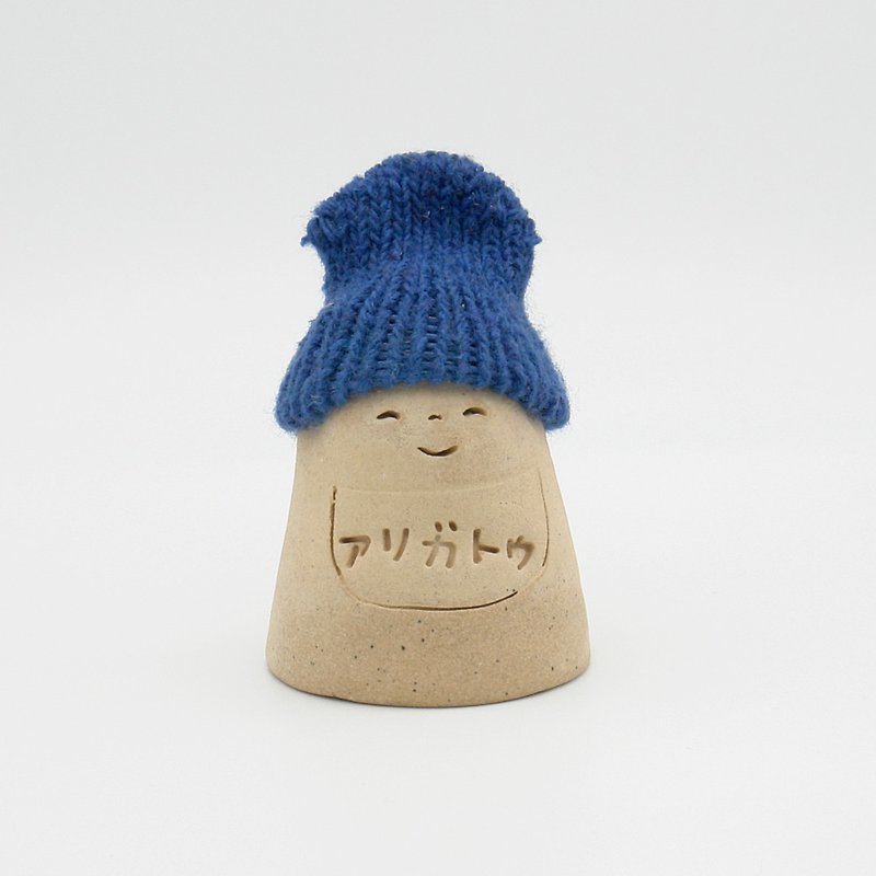 Handmade ceramic doll Arigato Jizo wearing a knitted hat