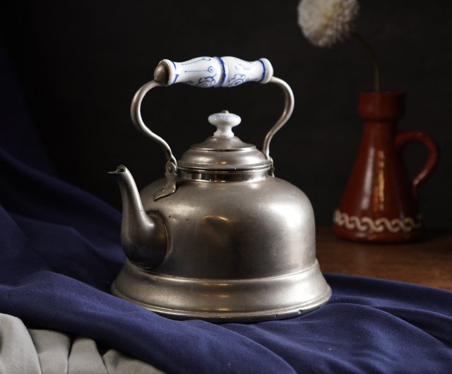 Old Dutch kettle with handpainted ceramic handle and lid top