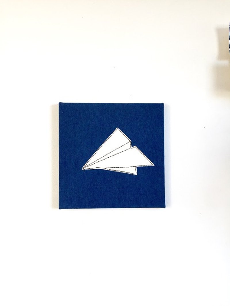 Fabric panel paper airplane
